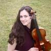 Dalia Shvartsman holding a violin