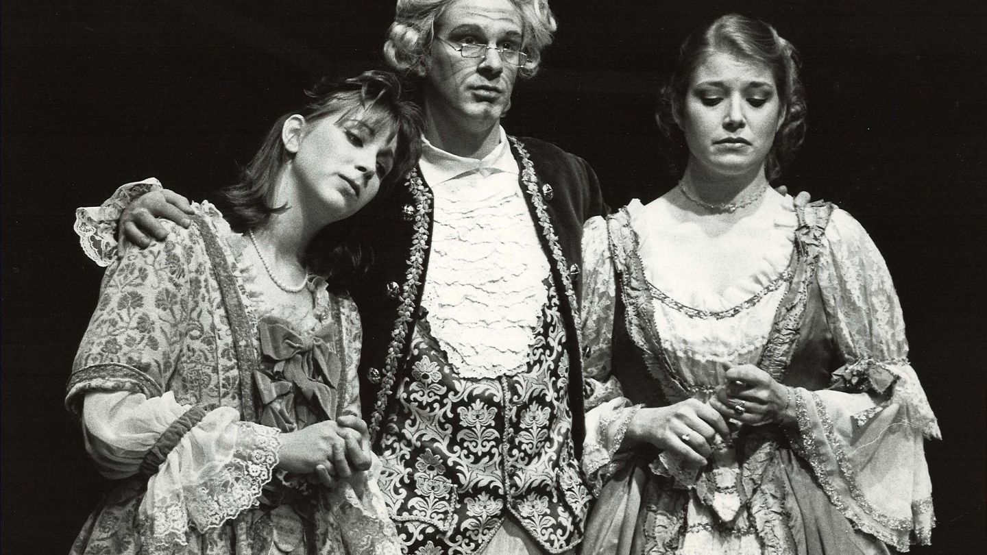 Black-and-white photo of three opera singers