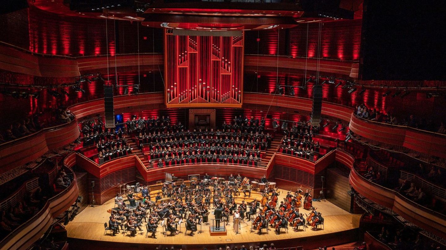 Photo of symphony orchestra performing in a concert hall